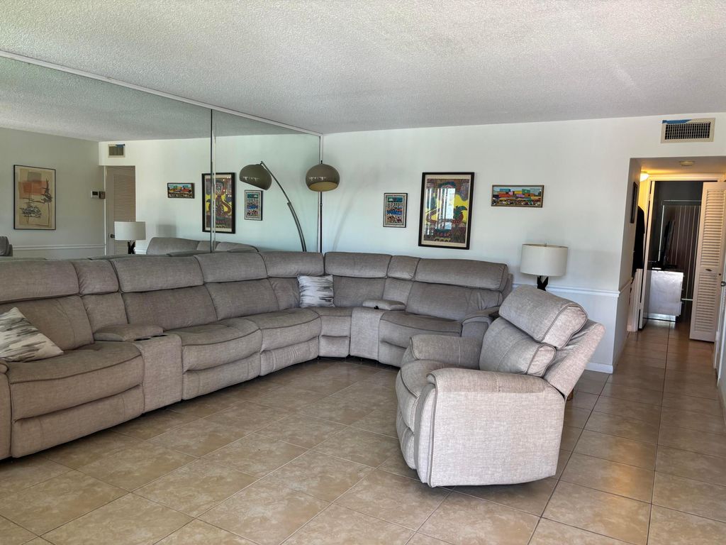 Photo of 105 E Wellington Dr #105, West Palm Beach, FL 33417 (MLS # B26017762)