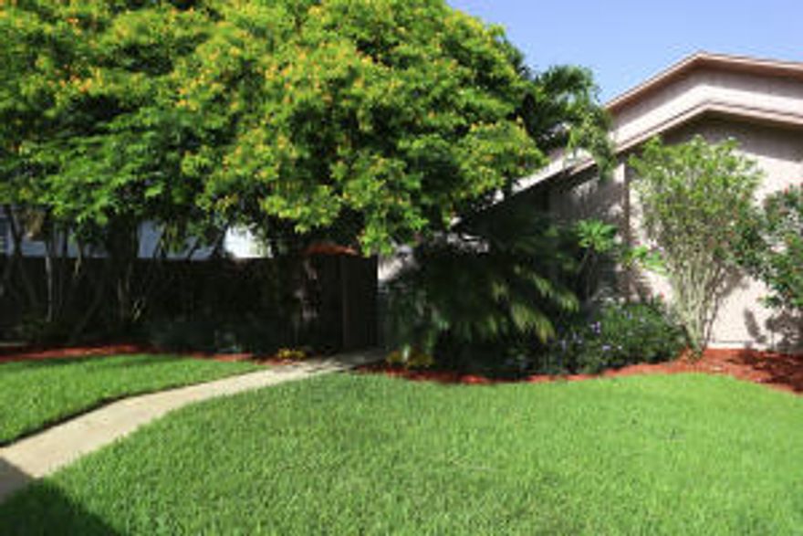 1001 Summer Winds Lane is a beautiful 3 bedroom, 3 bath, 2-story town home located in the heart of Jupiter. With nearly 1,500 sq ft this spacious home offers newly updated kitchen featuring wood cabinetry & granite counter tops, updated bathrooms & redesigned fireplace. The large front & back patio's are perfect to enjoy the outdoors & entertain your guests. Front terrace is piped for waterfall installation, front & back patios have slate tile flooring.This unit has been freshly painted & new appliances have been installed. New A/C unit with RGF (Guardian air purifier), new washer & dryer and new dishwasher. Mexican tile throughout downstairs, bamboo flooring upstairs, Brazilian cherry wood flooring in the master bedroom & crown molding throughout this beautiful home.