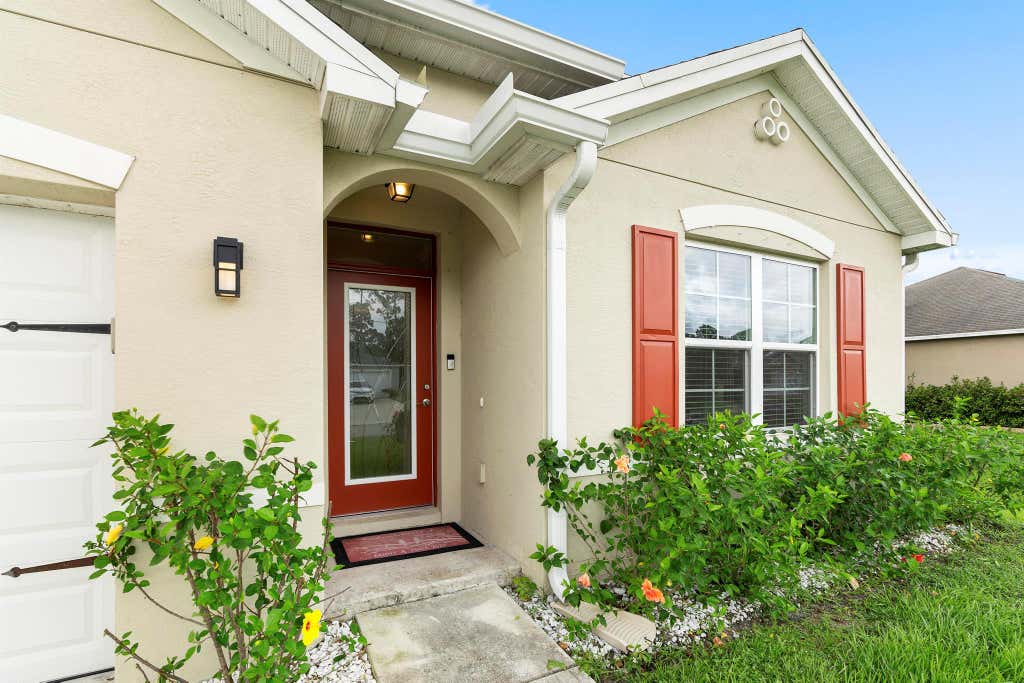 Photo of 1810 SW Capehart Avenue, Port Saint Lucie, FL 34953 (MLS # R10995126)