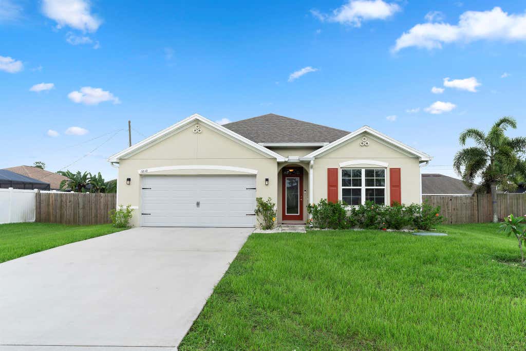 Photo of 1810 SW Capehart Avenue, Port Saint Lucie, FL 34953 (MLS # R10995126)