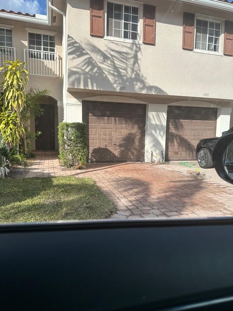 Photo of 4111 Napoli Lake Drive, West Palm Beach, FL 33410 (MLS # B26022366)