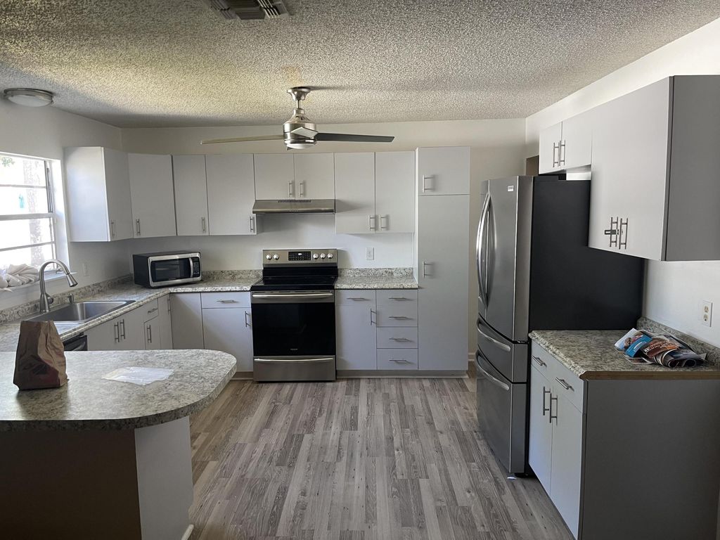 Photo of 2081 SW Gemini Lane, Port Saint Lucie, FL 34984 (MLS # R10964764)