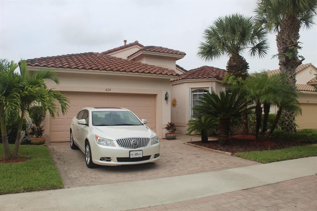 Photo of 424 NW Springview Loop, Port Saint Lucie, FL 34986 (MLS # R10740737)