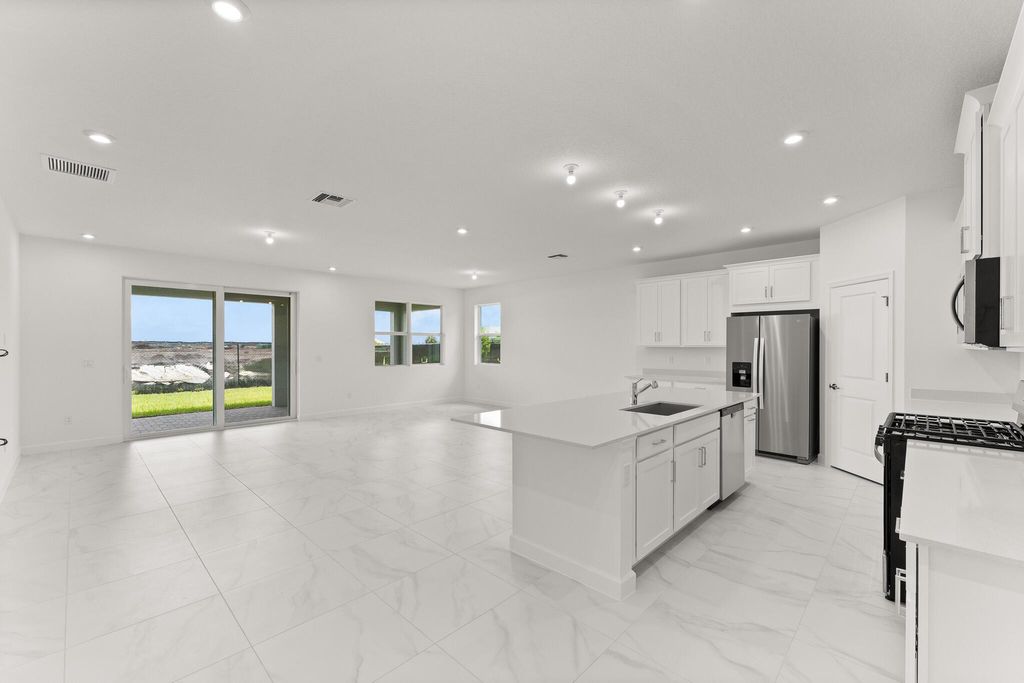 Photo of 14409 SW Ellison Drive, Port Saint Lucie, FL 34987 (MLS # R11131301)