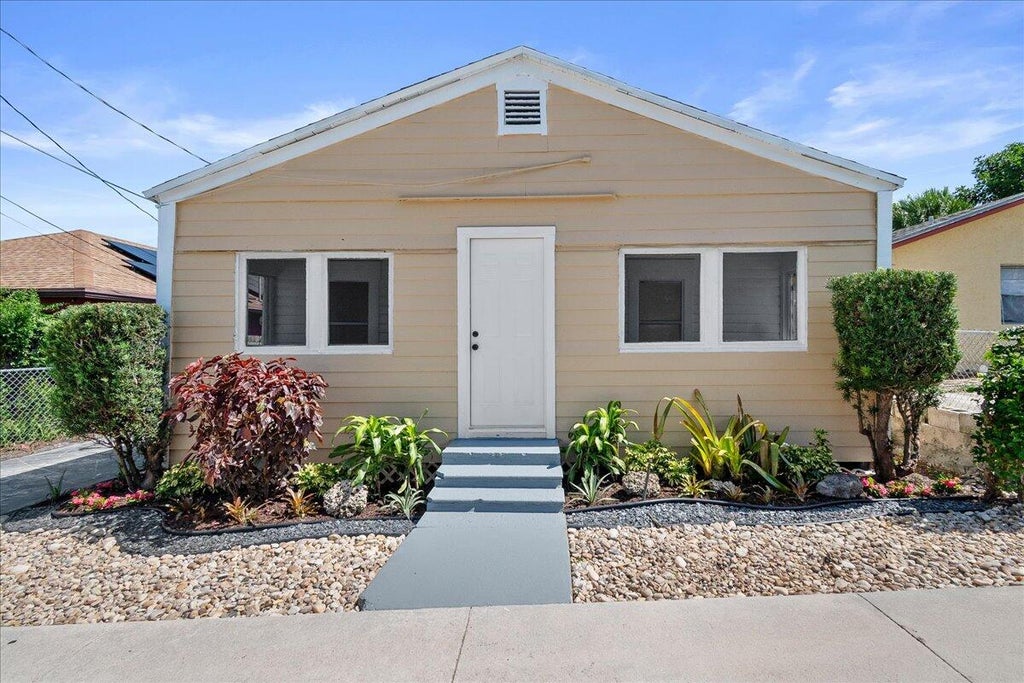 Photo of 1011 22nd Street, West Palm Beach, FL 33407 (MLS # B26042843)