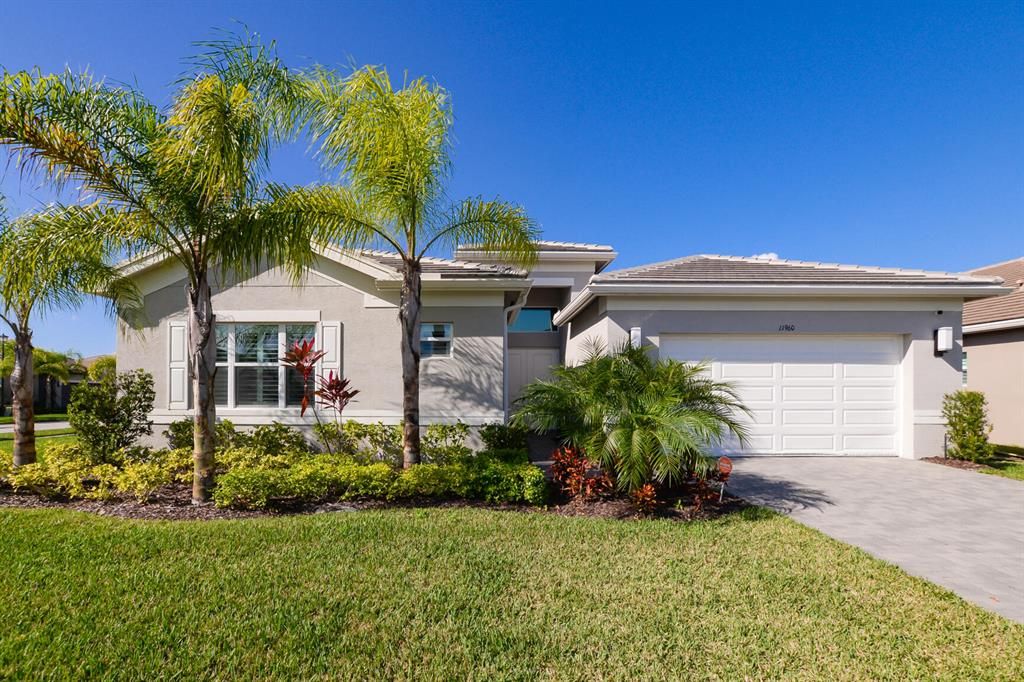 Photo of 11960 SW Marigold Lakes Drive, Port Saint Lucie, FL 34987 (MLS # R10764690)