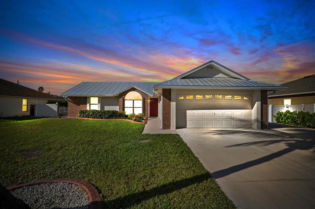 Photo of 1025 SW Jennifer Terrace, Port St Lucie, FL 34953 (MLS # R10849758)