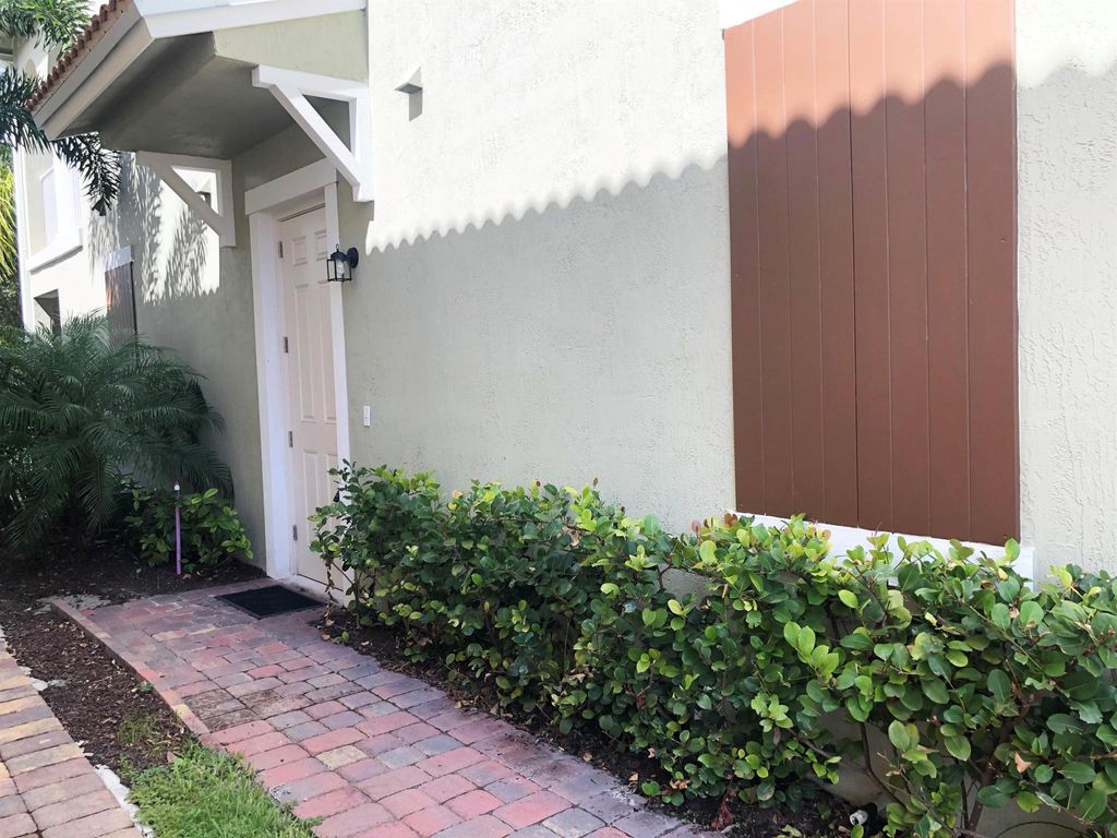 Photo of 1072 Community Drive, Jupiter, FL 33458 (MLS # R11086914)