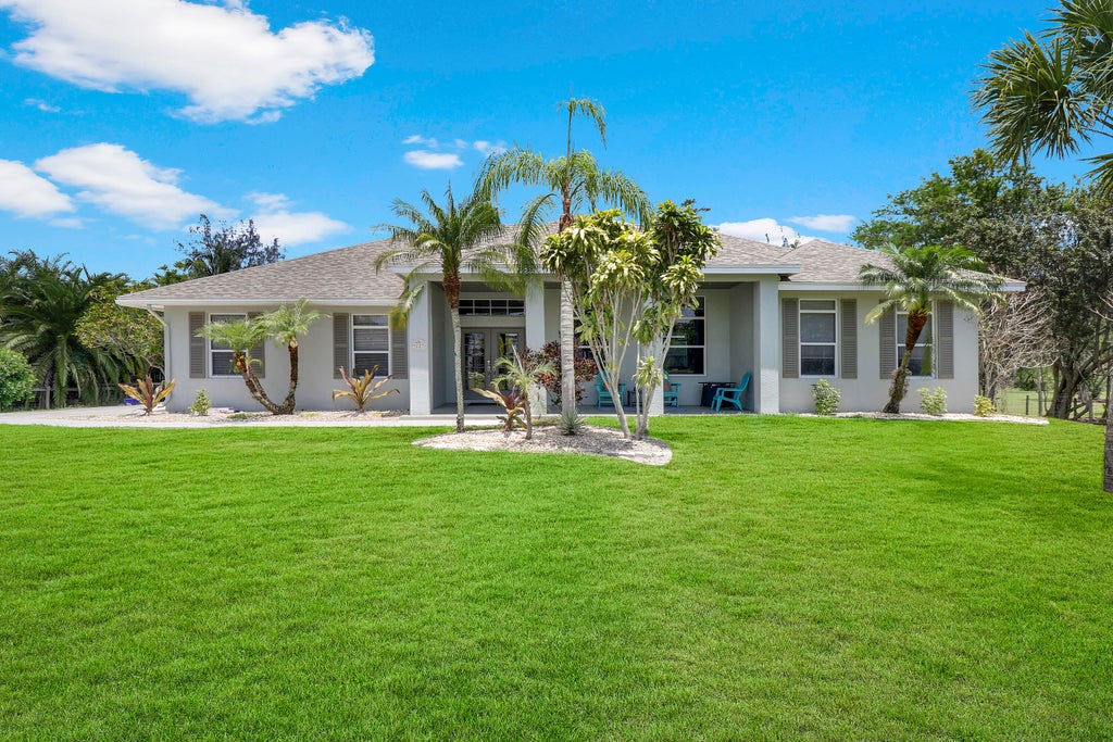 Photo of 9227 Quail Trail, Jupiter, FL 33478 (MLS # R11142585)