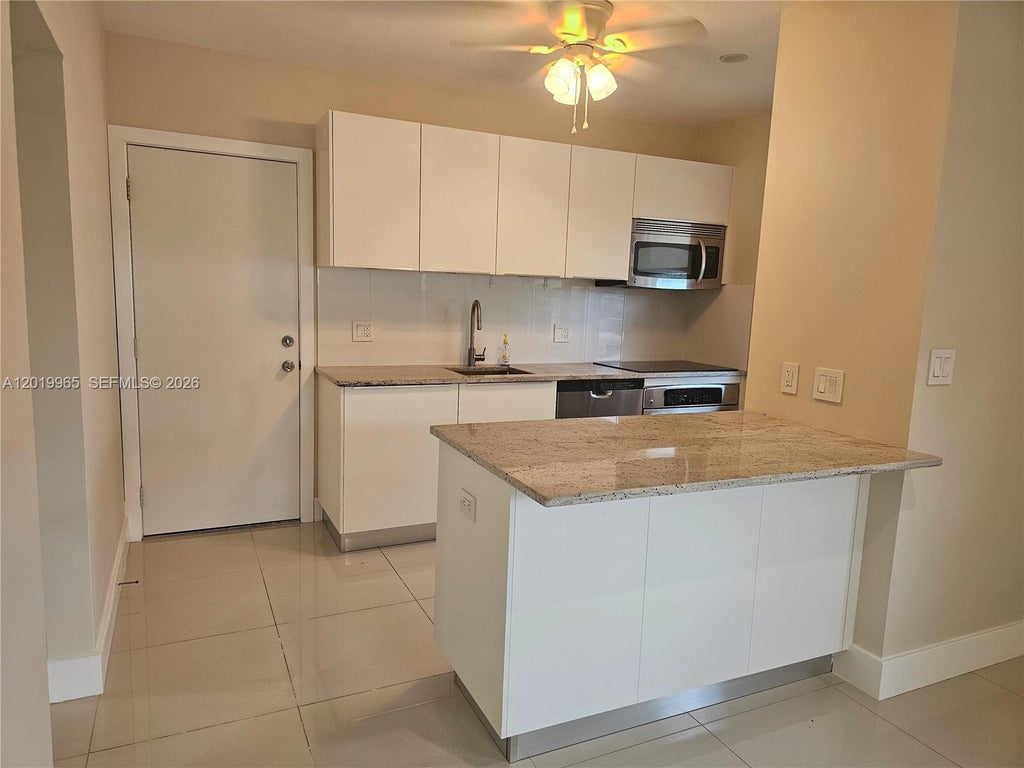 Photo of 241 NE 1st Terrace #12, Dania Beach, FL 33004 (MLS # A12019965)