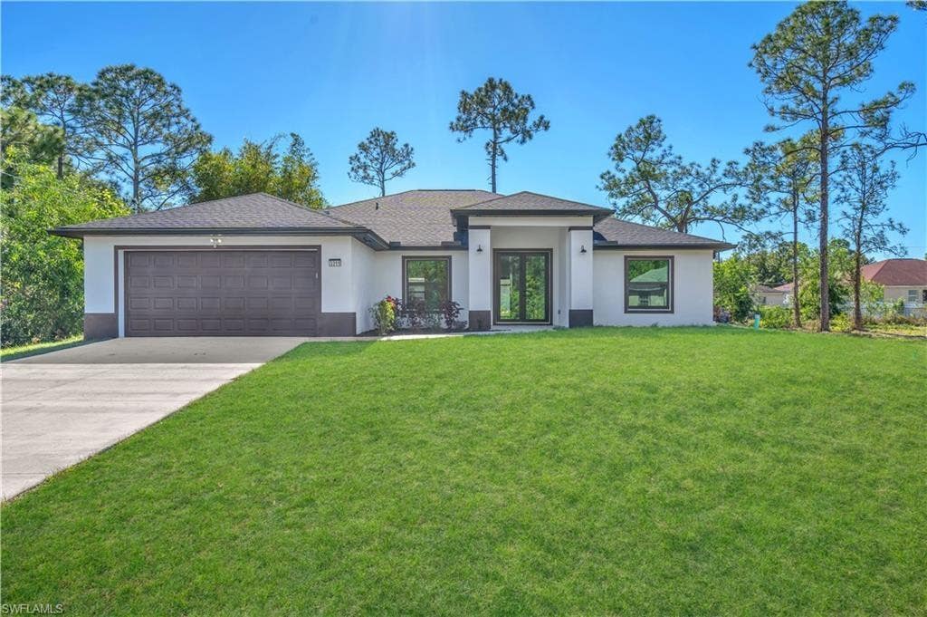 Photo of 3311 23rd Street, Lehigh Acres, FL 33971 (MLS # F10551628)
