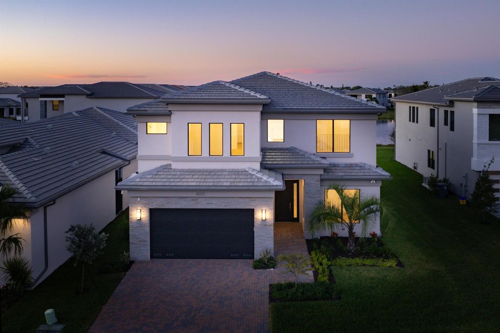 Photo of 8227 Essex Country Club Drive, Boca Raton, FL 33434 (MLS # R11042735)