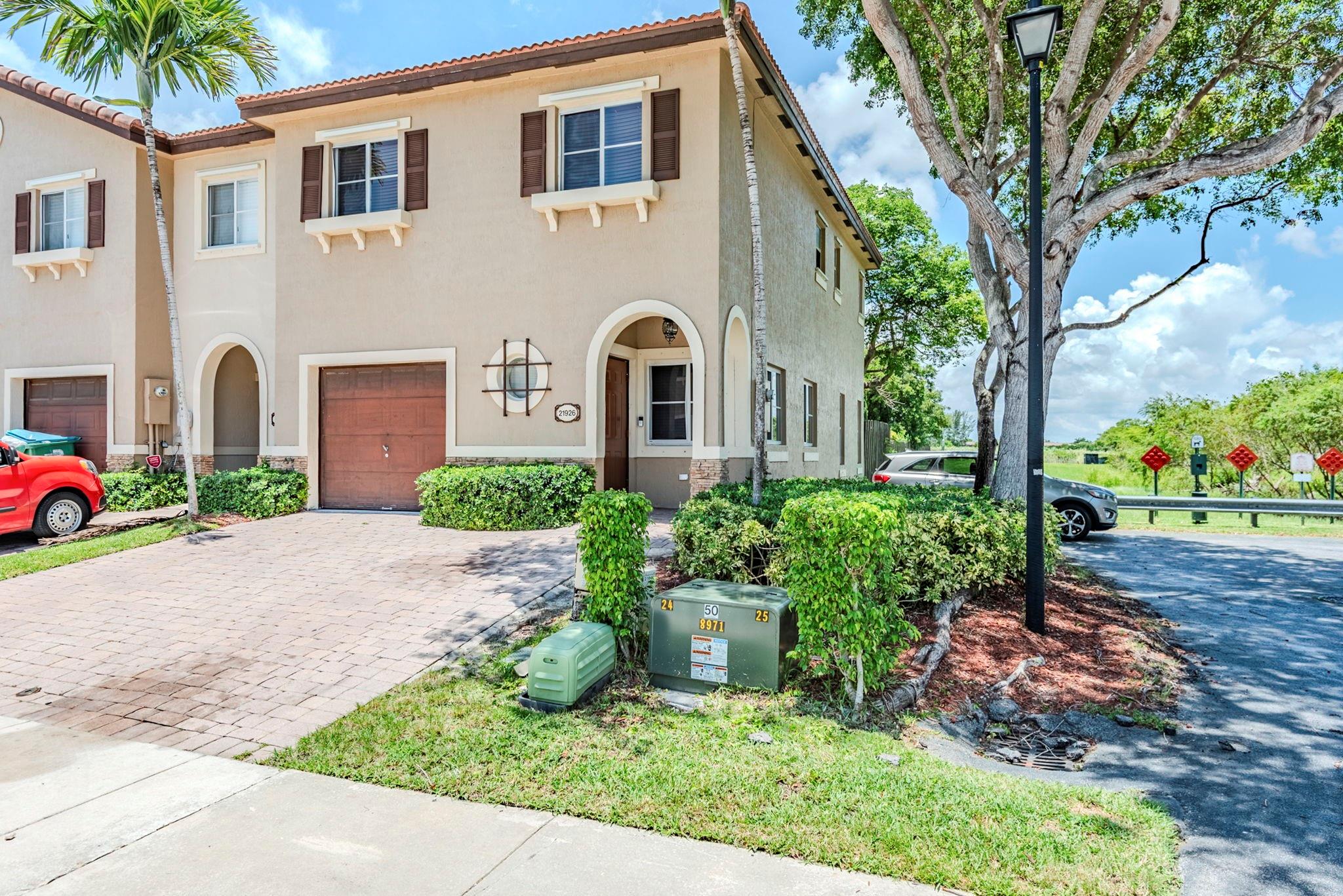 One or more photo(s) was virtually staged. Beautiful two-story townhouse featuring 3 bedrooms and 2.5 bathrooms, offering a comfortable and functional layout. The kitchen includes a center island, perfect for meal prep and gathering, and opens to the main living space. Enjoy the convenience of an attached 1-car garage and a dedicated laundry room. The primary suite offers a spacious closet and a bathroom with a separate tub and shower for added luxury. Step outside to a small wood-fenced backyard, ideal for relaxing or entertaining. Schedule a showing today!