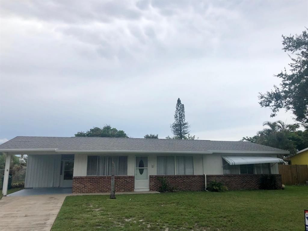 Photo of 135 NE Penlynn Avenue, Port Saint Lucie, FL 34983 (MLS # R10693551)