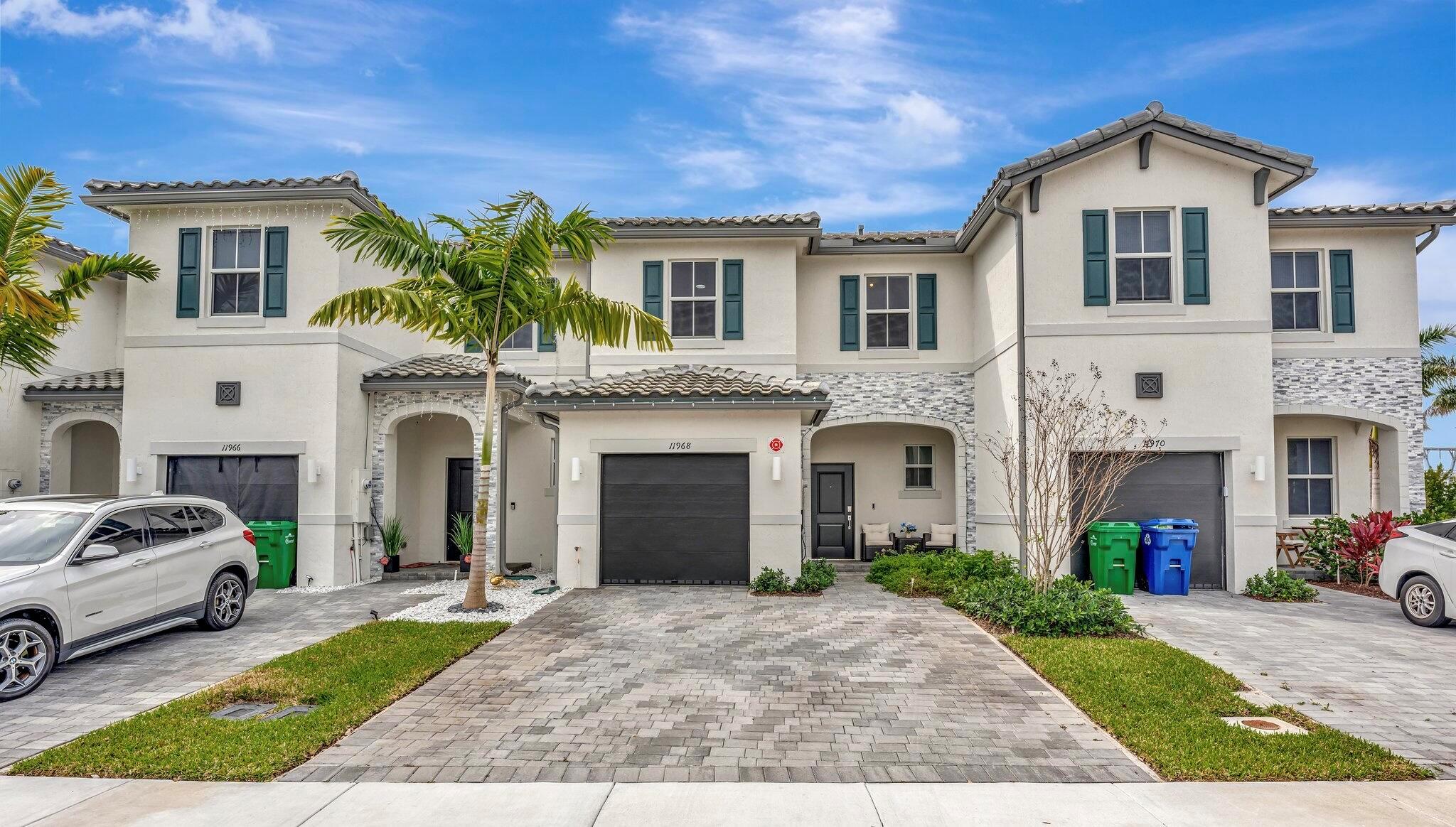 NEWER CONSTRUCTION! Fully upgraded Townhouse Built in 2024. Welcome to your new home in Coral Springs, featuring stunning 3 bedroom, 2.5 bath! Fully upgraded tile flooring, and wood vinyl. Enjoy a master suite with a walk-in closet, and living space designed for functionality. The kitchen is the highlight of the home with stainless-steel appliances and quartz countertops, and a convenient breakfast bar. Upgraded fixtures, accent wall and ceilings fans throughout. The back patio has been fully remodeled with artificial turf and pavers.This home offers impact windows and doors, 1-car garage plus driveway parking, community swimming pool, walking paths, and a playground. Located near shopping and dining, schools, and recreational activities.