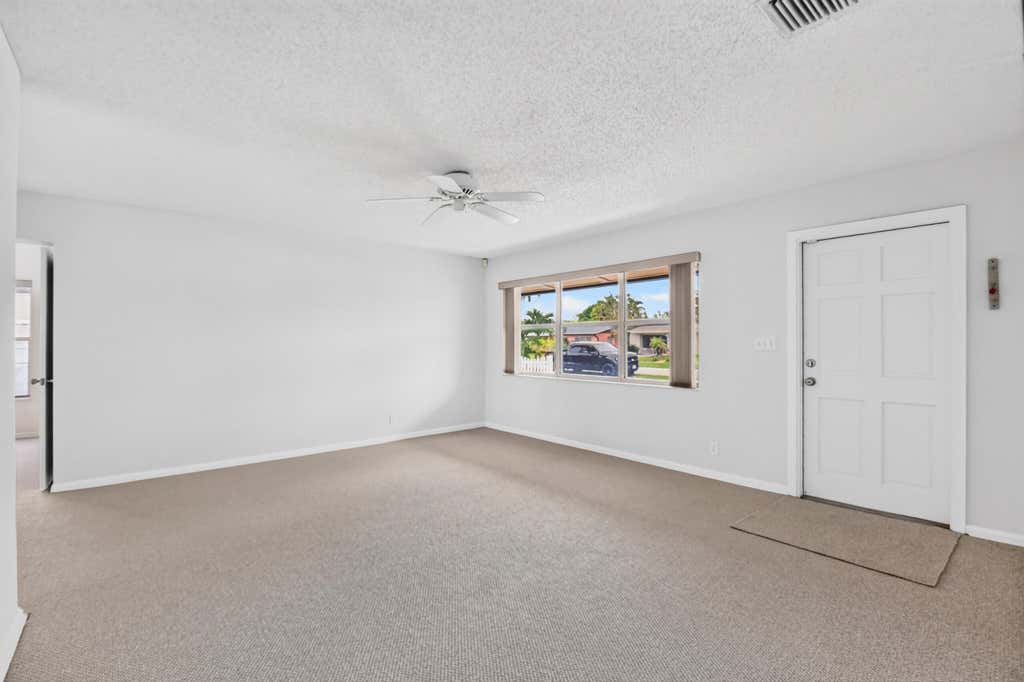 Photo of 129 GREENBRIER Drive, Palm Springs, FL 33461 (MLS # B26061697)