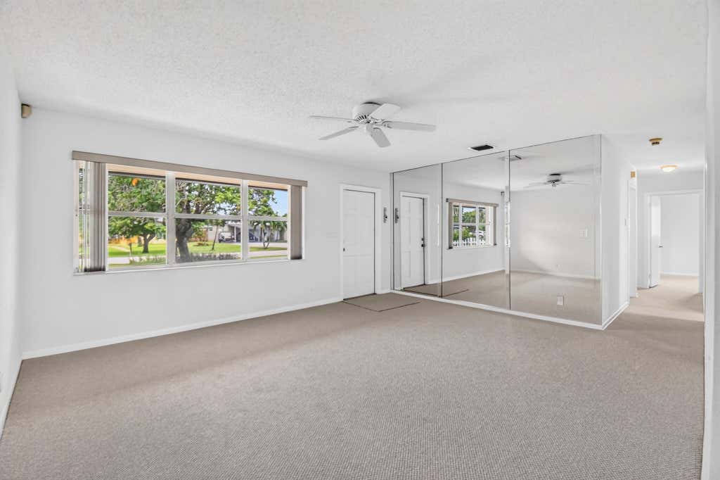 Photo of 129 GREENBRIER Drive, Palm Springs, FL 33461 (MLS # B26061697)