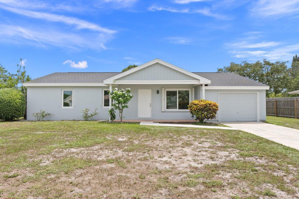 Photo of 1742 SE Burgundy Lane, Port Saint Lucie, FL 34952 (MLS # R11003745)