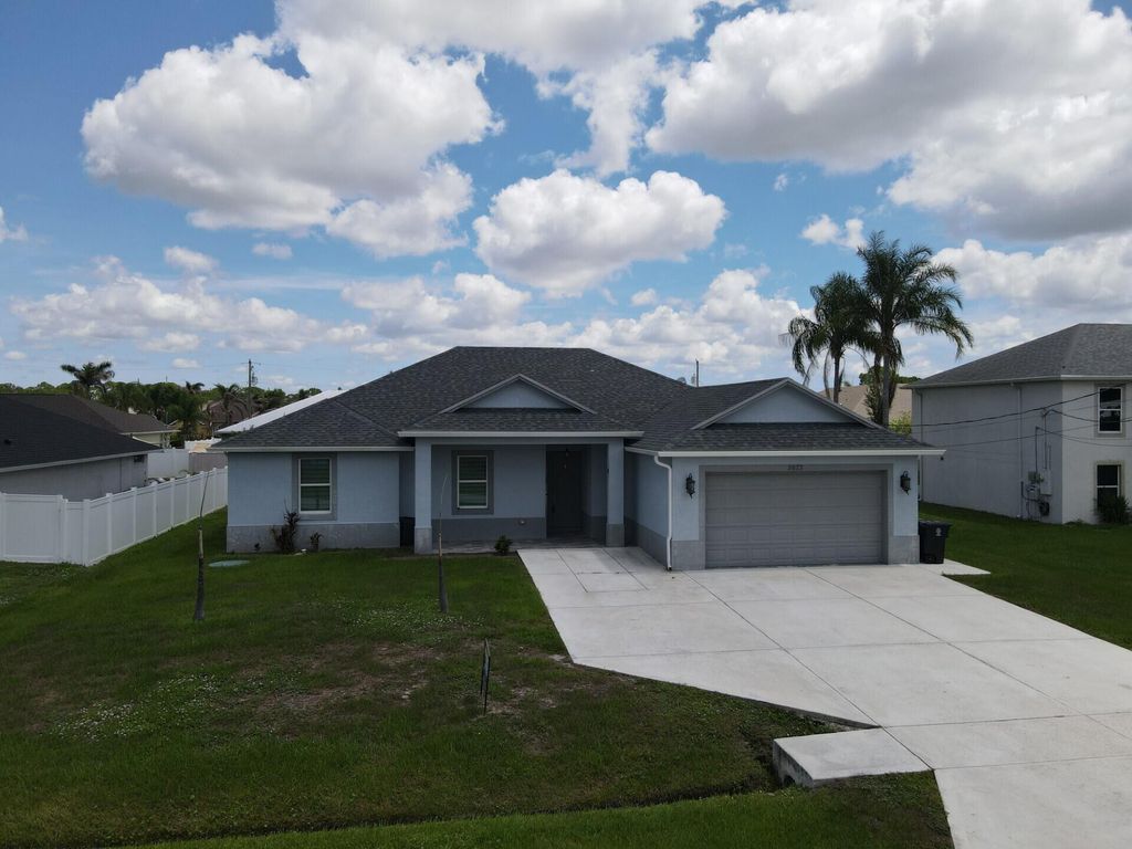 Photo of 5673 NW Whitecap Road, Port Saint Lucie, FL 34986 (MLS # B26041645)