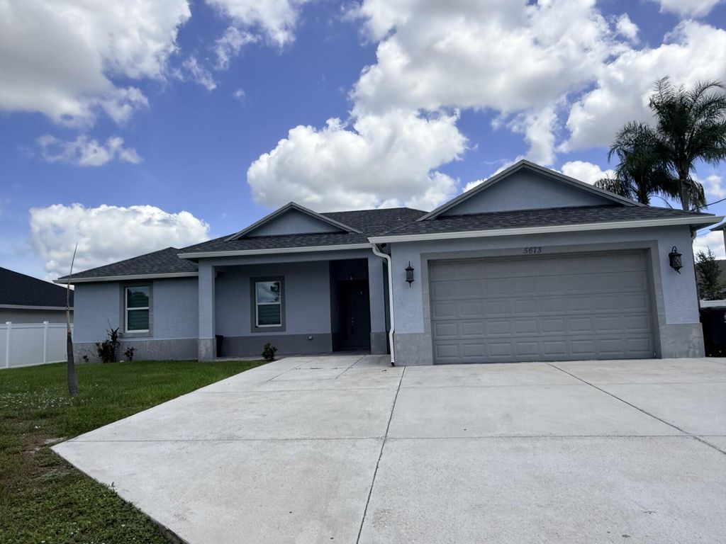 Photo of 5673 NW Whitecap Road, Port Saint Lucie, FL 34986 (MLS # B26041645)