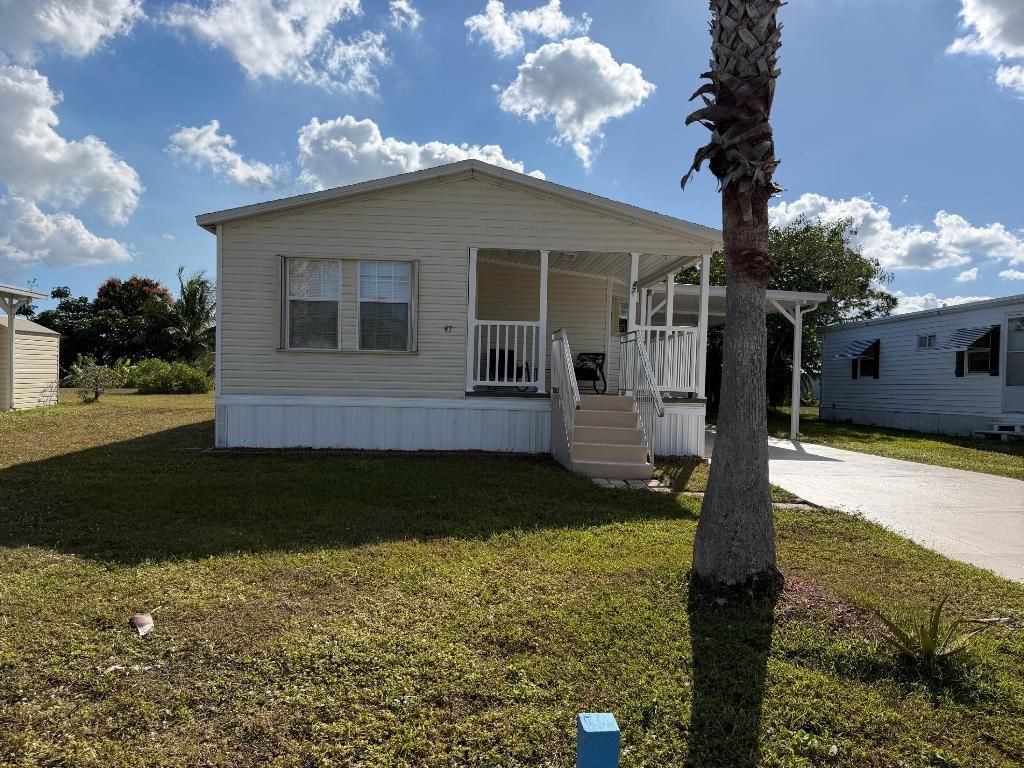Photo of 47 El Camino Real Real, Port Saint Lucie, FL 34952 (MLS # R11151870)