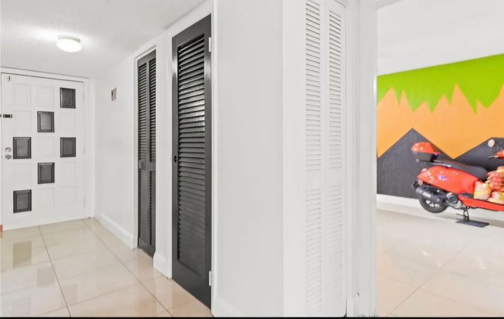 Photo of 5961 N Falls Circle Drive #103, Lauderhill, FL 33319 (MLS # F10481072)