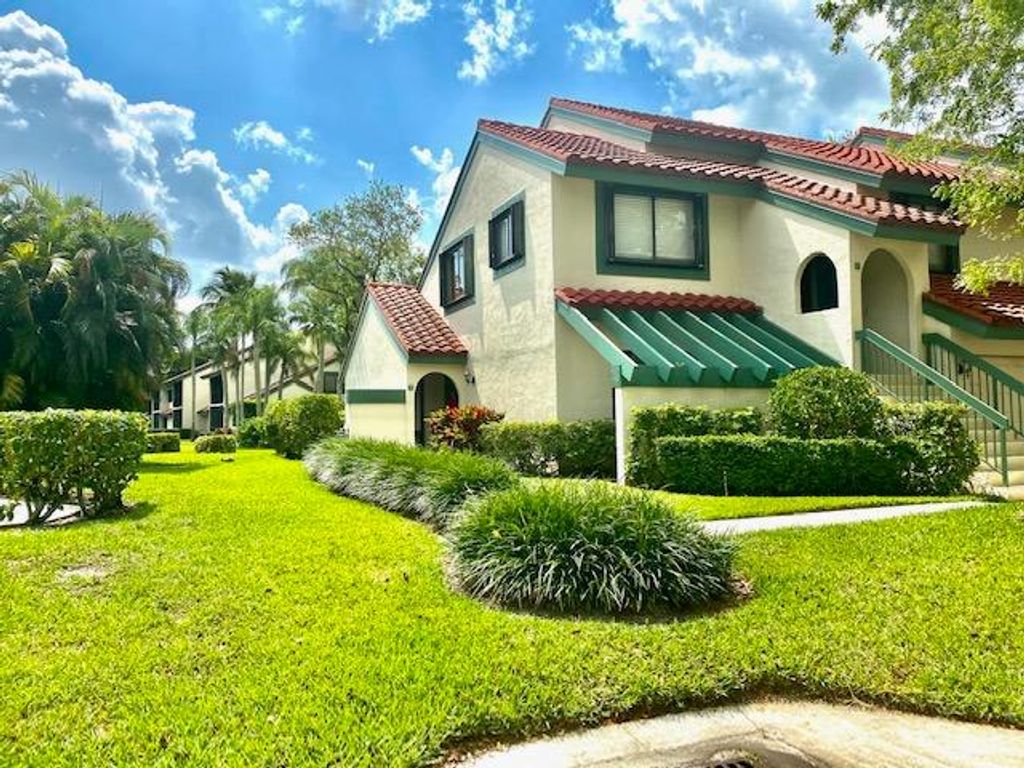 Photo of 21 Lexington A Lane W #A, Palm Beach Gardens, FL 33418 (MLS # R10710993)