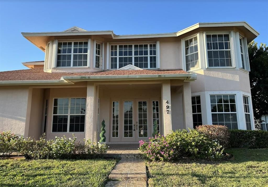 Photo of 497 SW Dagget Avenue, Saint Lucie West, FL 34953 (MLS # R10786703)