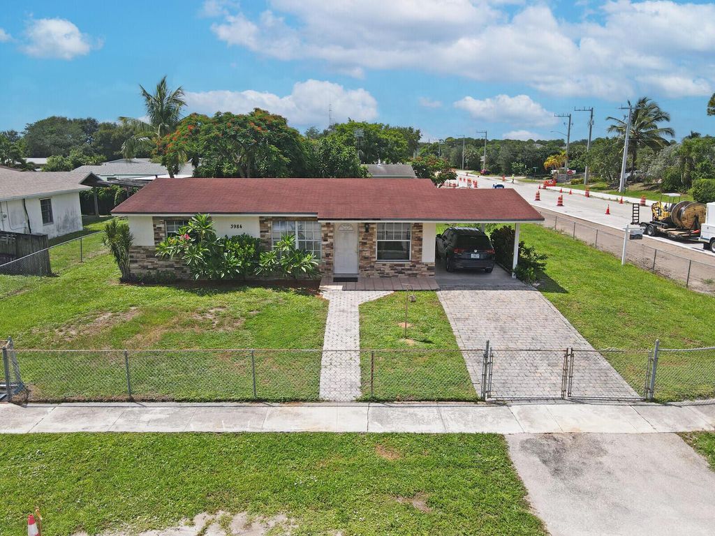 Photo of 3984 Chickasha Road, Lake Worth, FL 33462 (MLS # R11010814)