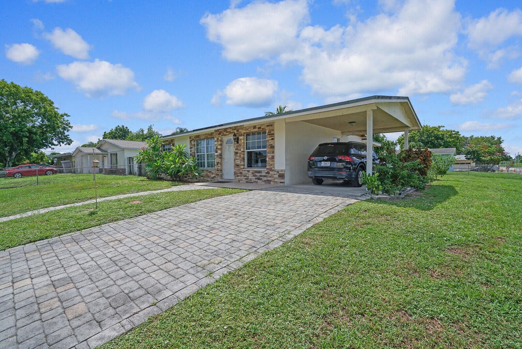 Photo of 3984 Chickasha Road, Lake Worth, FL 33462 (MLS # R11010814)