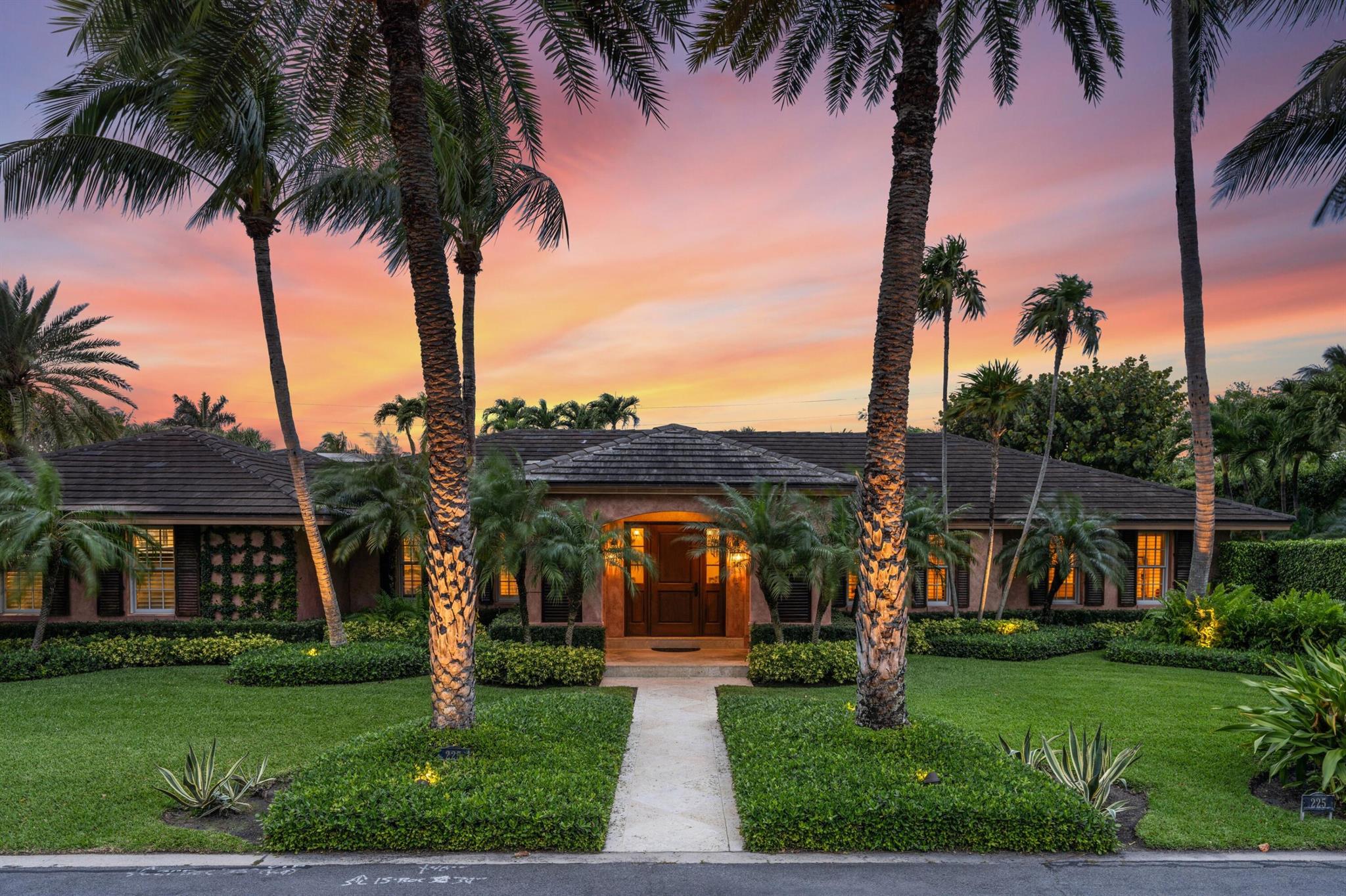 This idyllic residence spreads over 5,875 total square feet of living space that offers five bedrooms, five and one-half baths, a living room, family room, den, dining room, Chef's Kitchen and a spacious air conditioned 2-car garage. The property comes with stunning outdoor living space that features an oversized 150' x 128' lot with a gorgeous 48 foot covered pecky cypress loggia that overlooks the pool and beautifully designed grounds of the property. This property also includes a rare private gated beach access. The ocean is a few houses away and can be easily reached by a private alley behind Sandpiper Drive. The bike trail is also close by. Turnkey condition ready to move in.