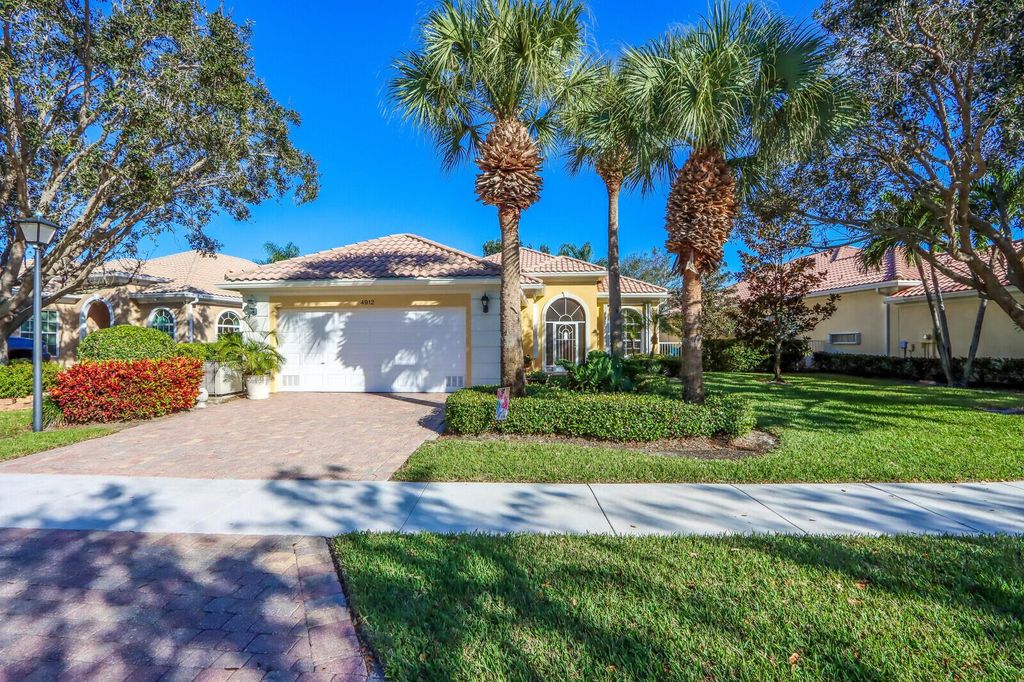 Photo of 4912 Grassleaf Drive, Palm Beach Gardens, FL 33418 (MLS # R10867388)