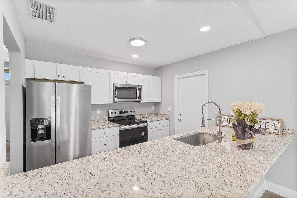 Photo of 4777 SE Salvatori Road, Stuart, FL 34997 (MLS # R11080307)