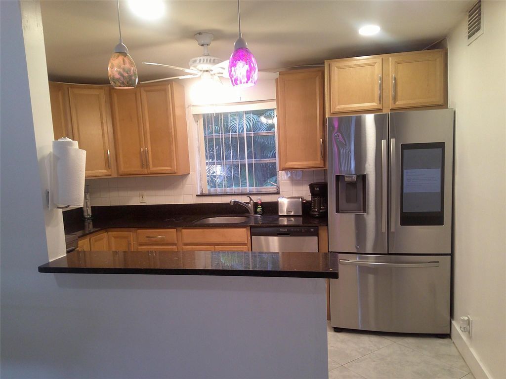 Photo of 5383 SW 40th Avenue #103, Fort Lauderdale, FL 33314 (MLS # F10548971)