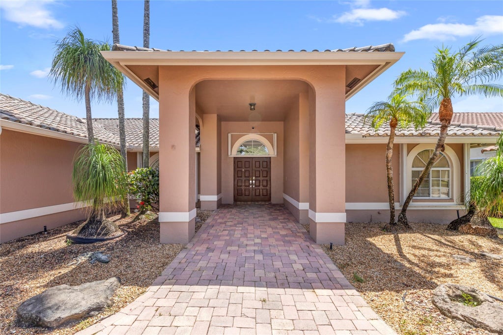 Photo of 5001 NW 103rd Avenue, Coral Springs, FL 33076 (MLS # F10515519)