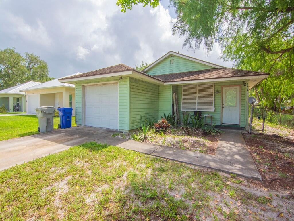 Great investment property or ideal starter home! Located in Vero Beach, 2240 86th Dr offers solid bones with a 2005 roof, newer water heater, and recently serviced AC system. Current tenant pays $1,500/month on a month-to-month lease and would like to stay. This home presents a great opportunity to add value with cosmetic updates while enjoying a functional layout in a convenient location near shopping, dining, and beaches. Whether you're looking to start your real estate portfolio or find your first home, this property delivers on potential and location.