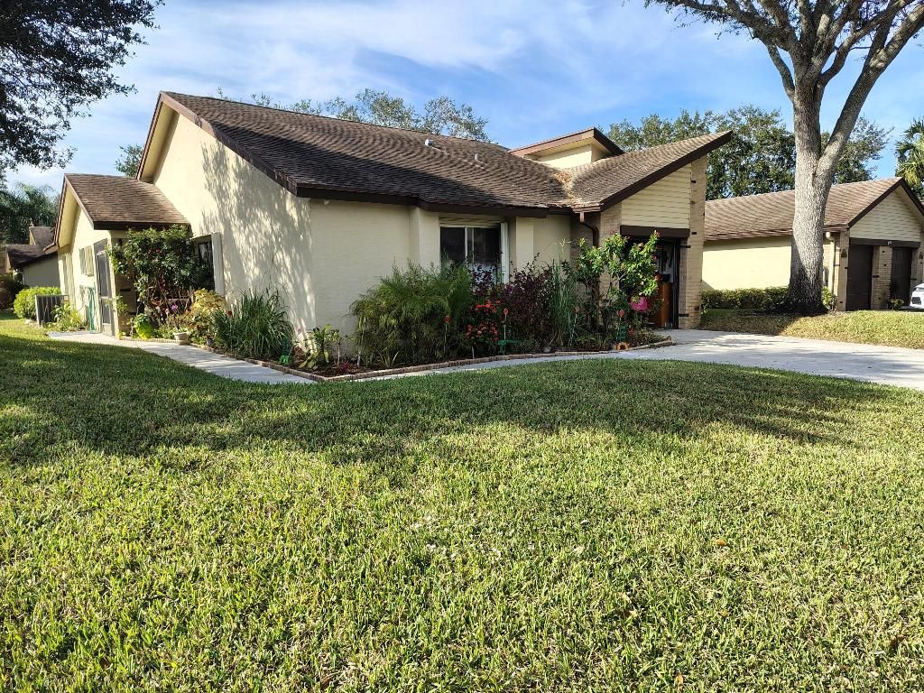 Photo of 125 Ramblewood Circle, Royal Palm Beach, FL 33411 (MLS # R11147047)