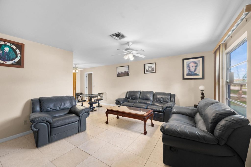 Photo of 113 SW Starfish Avenue, Port Saint Lucie, FL 34984 (MLS # B26019353)
