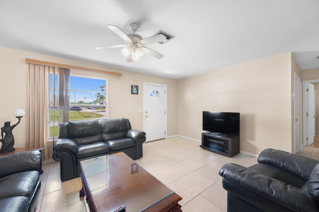 Photo of 113 SW Starfish Avenue, Port Saint Lucie, FL 34984 (MLS # B26019353)