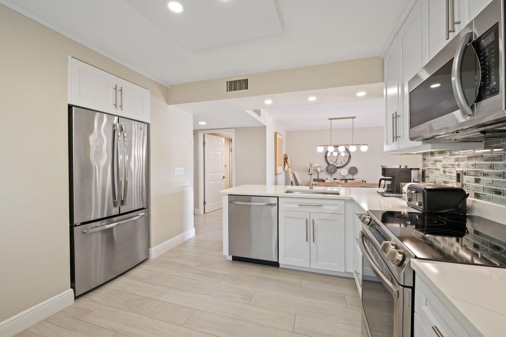 Photo of 15451 Pembridge Drive #206, Delray Beach, FL 33484 (MLS # F10541235)