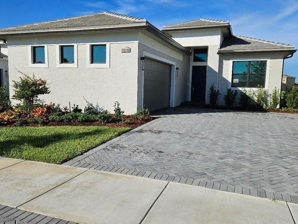 Photo of 12130 Fortezza Way, Port Saint Lucie, FL 34987 (MLS # R11151798)