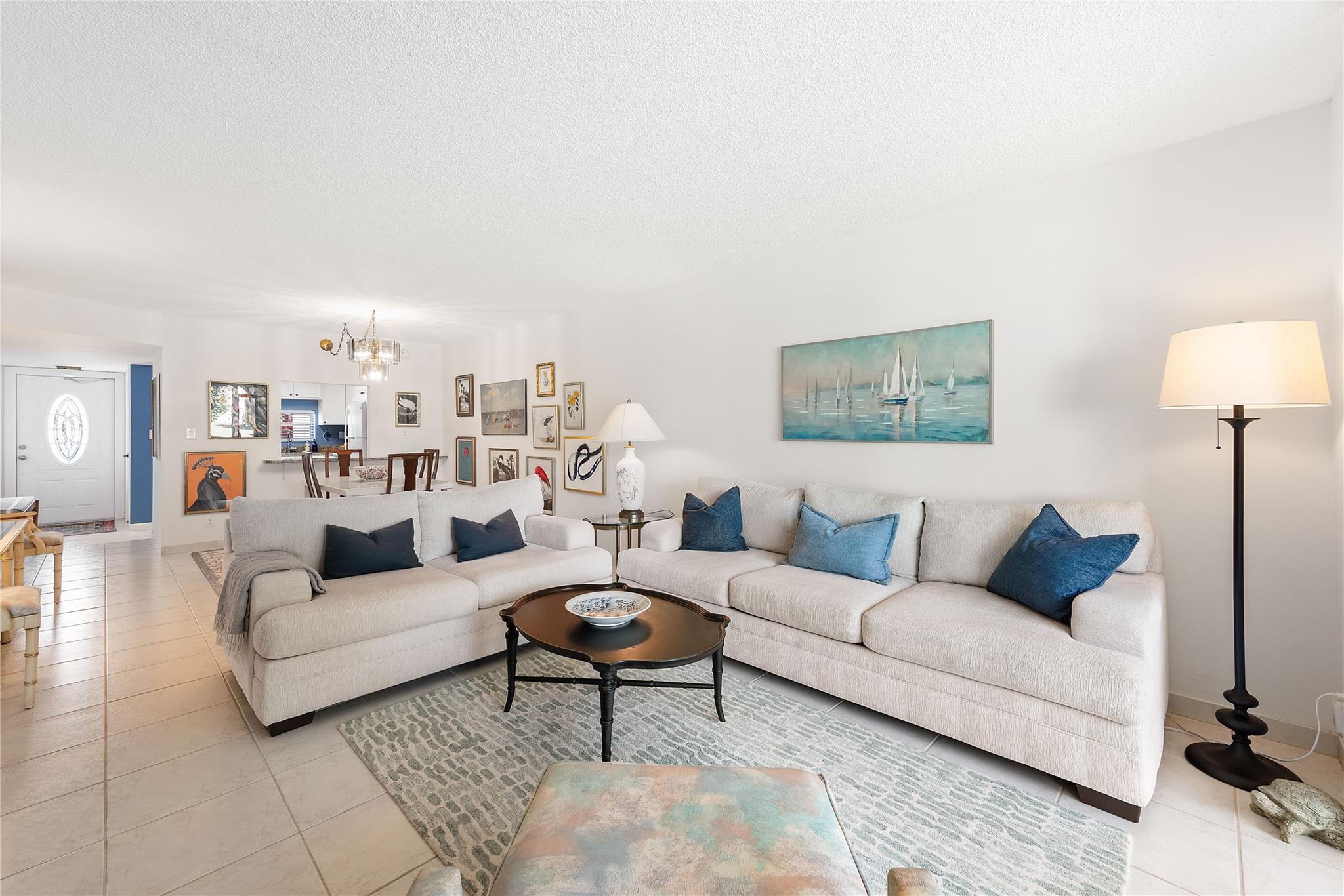 Don't miss this exceptional opportunity to be a part of one of South Florida's Premier Active Adult Communities and live in this Modern Updated condo with an Exquisite View. Kitchen with Granite & New Appliances. Brand new PERMITTED master bathroom. Furnished or Unfurnished, your choice. First Floor condo...Park in front of the front door! Amenities galore! Residents GOLF for FREE just pay for cart on PGA Championship golf course or the 18 hole Par 3. Find 7 heated Swimming Pools w/BBQ areas, Tennis & Pickleball courts, Fitness Center, Club House with year around activities, on site Restaurant, Pet Friendly and so much more! Hollybrook is guard GATED 24/7. Unit rentable after 9 months of ownership. Rec Lease Paid in Full. Check age, Income & Credit requirements for Hollybrook association.