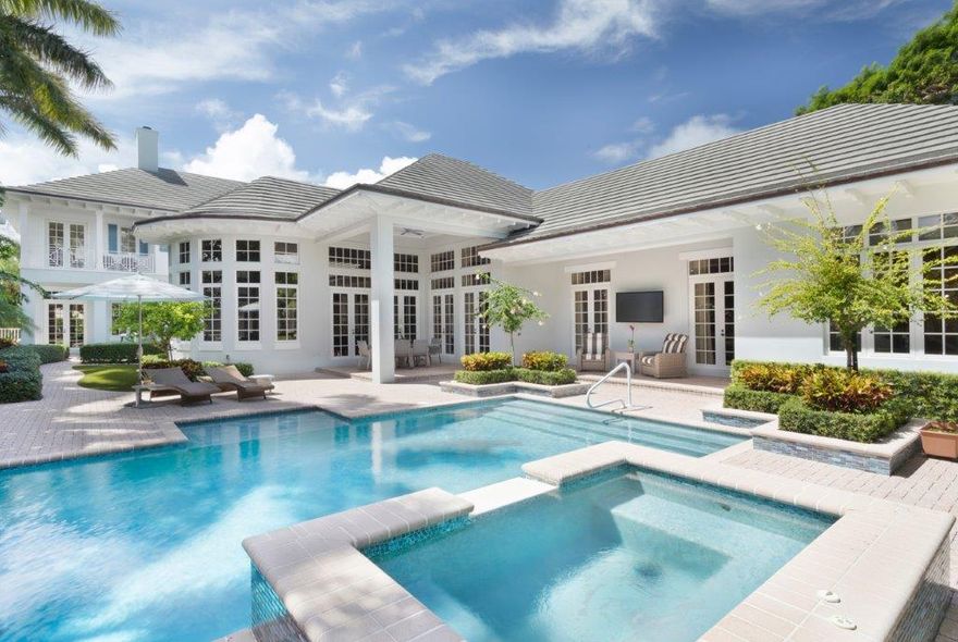 This exquisitely detailed Bermuda-style estate, just one block from the beach in a beautiful island-side enclave, features a light-filled flowing floor plan, custom built-ins, a spectacular chef's kitchen, fabulous pool and spa, beautiful porches and balconies, and a lovely tropical garden complete with a Toucan Bird Fountain. The information herein is deemed reliable and subject to errors, omissions or changes without notice.  The information has been derived from architectural plans or county records. Buyer should verify all measurements. DISCLAIMER: Information published or otherwise provided by the listing company and its representatives including but not limited to prices, measurements, square footages, lot sizes, calculations and statistics are deemed reliable but are not guaranteed and are subject to errors, omissions or changes without notice. All such information should be independently verified by any prospective purchaser or seller. Parties should perform their own due diligence to verify such information prior to a sale or listing. Listing company expressly disclaims any warranty or representation regarding such information. Prices published are either list price, sold price, and/or last asking price. The listing company participates in the Multiple Listing Service and IDX. The properties published as listed and sold are not necessarily exclusive to listing company and may be listed or have sold with other members of the Multiple Listing Service. Transactions where listing company represented both buyers and sellers are calculated as two sales. The listing company's marketplace is all of the following: Vero Beach, Town of Orchid, Indian River Shores, Town of Palm Beach, West Palm Beach, Manalapan Beach, Point Manalapan, Hypoluxo Island, Ocean Ridge, Gulf Stream, Delray Beach, Highland Beach, Boca Raton, East Deerfield Beach, Hillsboro Beach, Hillsboro Shores, East Pompano Beach, Lighthouse Point, Sea Ranch Lakes and Fort Lauderdale. Cooperating brokers are advised that in the event of a Buyer default, no commission will be paid to a cooperating Broker on the Deposits retained by the Seller. No commissions are paid to any cooperating broker until title passes or upon actual commencement of a lease. Some affiliations may not be applicable to certain geographic areas. If your property is currently listed with another broker, please disregard any solicitation for services. Copyright 2021 by the listing company. All Rights Reserved.