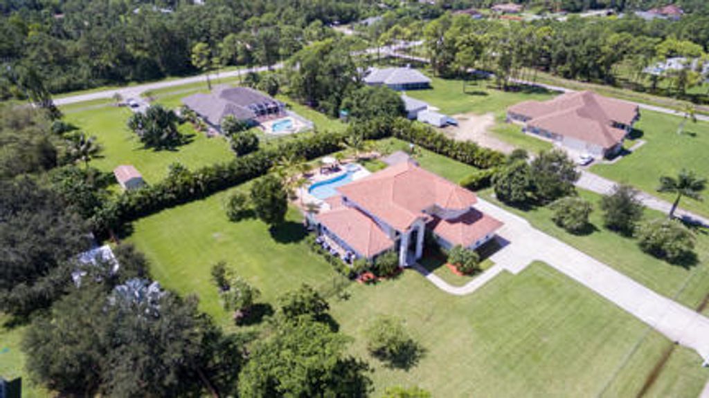 Photo of 12216 N 85th Rd Road N, West Palm Beach, FL 33412 (MLS # B26034188)