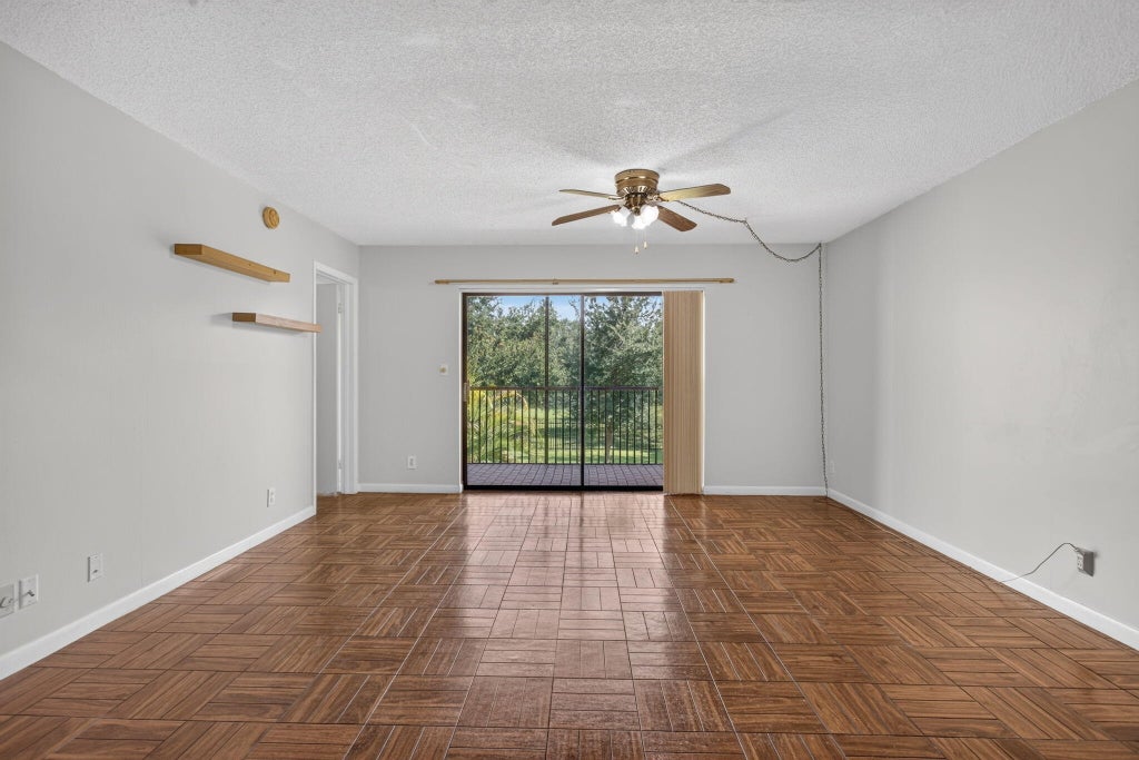 Photo of 2073 CORAL RIDGE Drive #N205, Coral Springs, FL 33071 (MLS # B26089755)