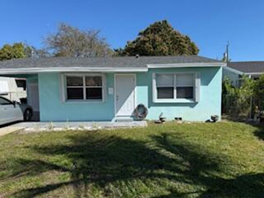 Beautiful 3 bedroom home, minutes from Lake Worth Beach.  Recently remodeled, new shaker wood  kitchen cabinets, new stainless steel appliances, new quartzite counter top. New bathroom, new tile flooring, new paint, new roof.  Washer and dryer in the unit. Large fence in yard. A must see!