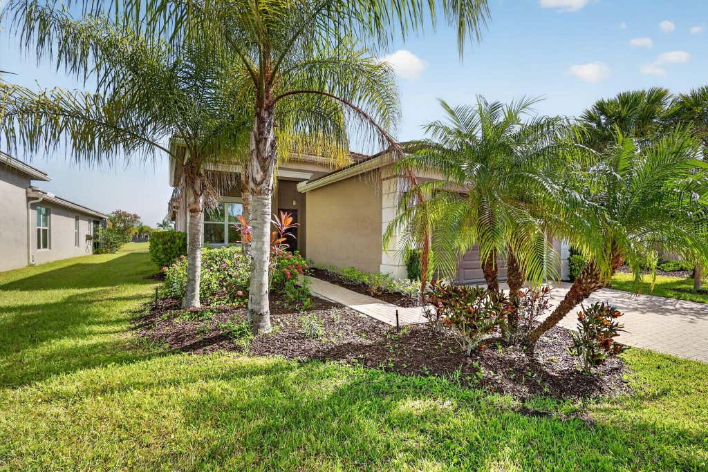 Photo of 10542 SW Sunray Street, Port Saint Lucie, FL 34987 (MLS # B26053850)