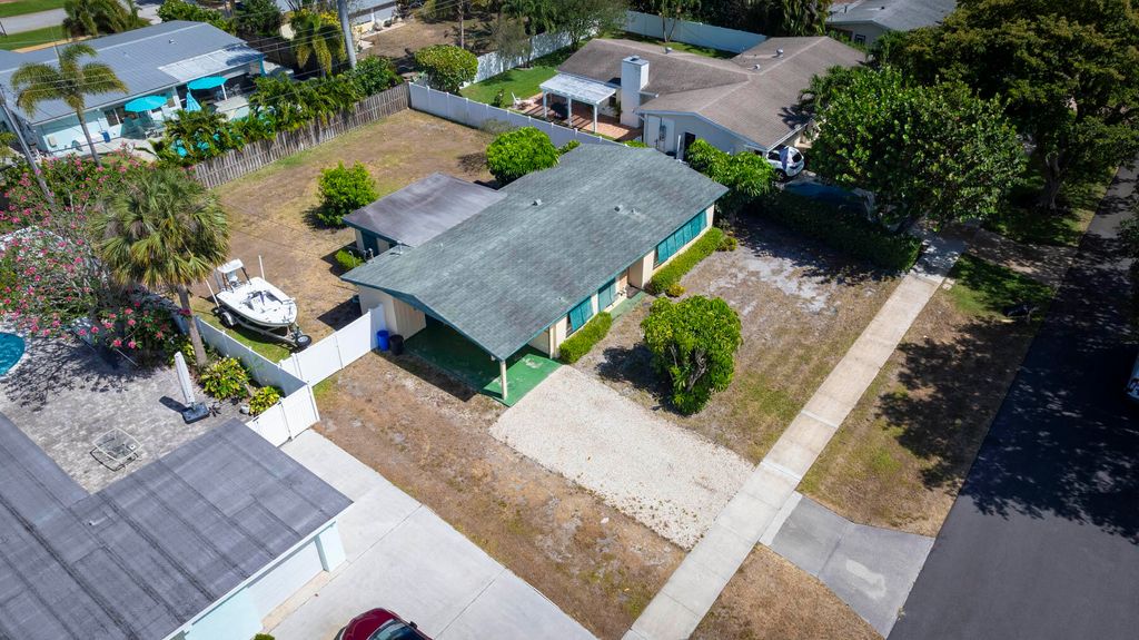 Photo of 736 Tradewind Drive, North Palm Beach, FL 33408 (MLS # R11091983)