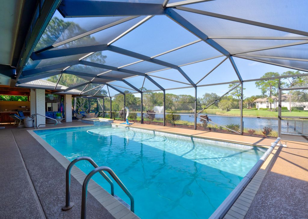 Photo of 1313 SW Troon Circle, Palm City, FL 34990 (MLS # R10848037)