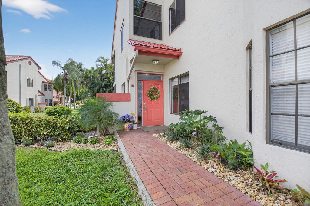 Photo of 7685 Lexington Club Boulevard #A, Delray Beach, FL 33446 (MLS # B26004934)